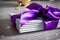 Christmas greeting card composition. Letters to santa claus tied with a purple ribbon with a bow