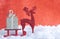 Christmas greeting card, red toy wooden sled, gift box, deer
