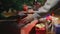 Christmas Hands putting Christmas presents under the Christmas tree