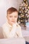 Christmas happy boy. Luxury attractive red hair child. Xmas miracle. bokeh