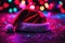 Christmas hat on the floor with bright lights around, xmas wallpaper