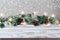 Christmas holiday background with empty wooden white table and Christmas lights