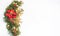 Christmas holiday faux poinsettia pine wreath with white copyspace.