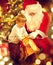 Christmas holiday scene. Cute little boy and Santa Claus