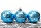 Christmas holiday tinsel with blue balls isolated