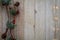 Christmas Holiday Winter still life concept on wooden board with evergreen and berry swag