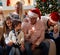 Christmas holidays- family with sprinklers celebrating xmas