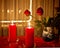 Christmas at home, red roses and red candles