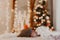 Christmas home room with tree and festive bokeh lighting, blurred holiday background