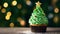 Christmas homemade cupcake as Xmas tree with green whipped cream and star on golden bokeh background, Copy space