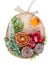 Christmas homemade decoration toy  in rustic style made  of dry red orange rose cones and red  berries on a wooden  slice