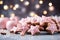 Christmas homemade pink gingerbread cookies on the tables and candles on bokeh background. Copy space