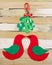 Christmas image of cute bird shapes cut out of felt that are kissing under mistletoe cut out of felt and tied with a red and white