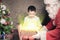 Christmas inspiration! Happy shocked boy surprised to see Santa