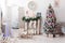 Christmas interior decorations: christmas tree in bright room