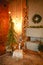 Christmas interior in the style of a Scandinavian loft: gray concrete, wooden decor, incandescent lamps, realistic artificial Chri