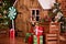 Christmas interior with wooden house, candy, tree and gifts. No people. Holiday background