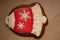 Christmas jingle bell gingerbread on garland background