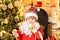 Christmas for kid. Funny child Christmas. Santa fun. Merry Christmas and happy new year. Santa holding cookie and glass