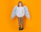 Christmas kids. Little cupid angel child with wings. Studio portrait of angelic kid.