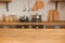 Christmas kitchen decor and copy space. Rustic kitchen in defocus. Wooden table in focus