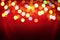 Christmas lamp arranged on red background