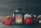 Christmas lamp and glass spheres with cones on a wooden background.