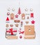 Christmas layout with craft paper wrapping gift boxes, tags, cookies, red holiday decoration, present, spices, Santa hat