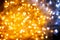 Christmas light from garlands of light bulbs, yellow-blue bokeh,