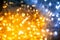 Christmas light from garlands of light bulbs, yellow-blue bokeh,