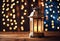 Christmas Light And Wooden Tree On Table With Defocused Rustic Background