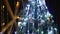 Christmas lights on decorated holiday tree. blurred xmas background for winter holidays. golden, white garland lights