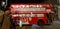 Christmas lights old buildings London architecture topless bus