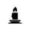 Christmas Lit Candle and Candlestick Holder. Flat Vector Icon illustration. Simple black symbol on white background. Lit Candle,