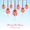 Christmas lollipops with bow on snowy background