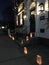 Christmas luminarias outside an historic shop