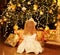 Christmas, magic, people concept - happy baby dreams