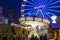 Christmas market with carrousel and ferris wheel in Duisburg, Ge