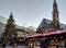Christmas Market with Church and Mountaints