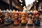 Christmas market with traditional wooden dolls on festive lights background