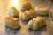 Christmas marzipan sweets on wooden table.