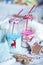 Christmas milk in bottles and holiday sweets. New Year party. Colored milk and straws