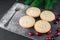 Christmas mince pie with christmas tree branch and cranberries