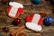 Christmas mittens gingerbread cookies decorated with icing on wooden table, flatlay. Christmas and New Year traditions, winter