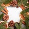 Christmas mockup composition. Cinnamon, anise, dried fruits, pine cones and fir needles decorations