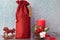 Christmas mockup wine gift bag and candle. New Years Eve Mockup