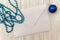 Christmas mokup with empty envelope,blue bead and balls.New Year