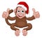 Christmas Monkey Cartoon Character in Santa Hat