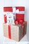 Christmas mood, gift boxes tied with ribbons, wooden calendar delivered on December 31, symbol of the new year