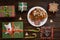 Christmas morning table with croissant and gifts. Top view